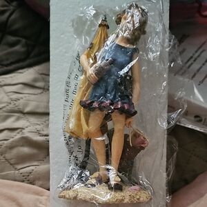 Charming Blue and Yellow Figurine